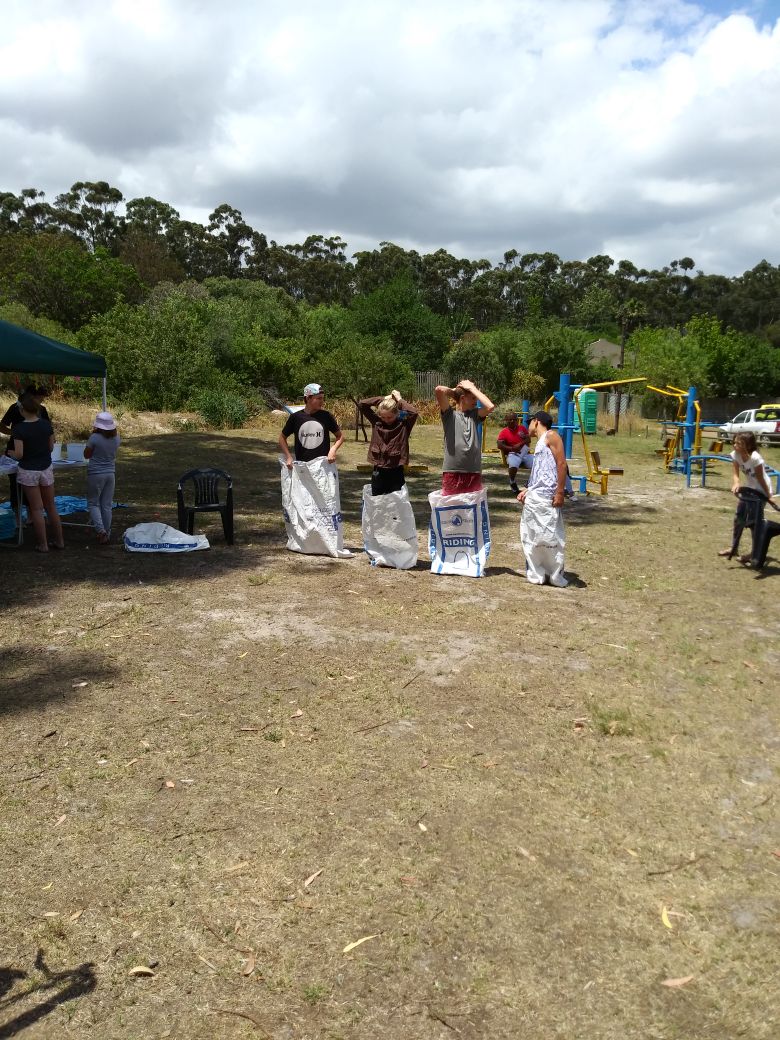 Sack race game at the Penhill Market Initiative